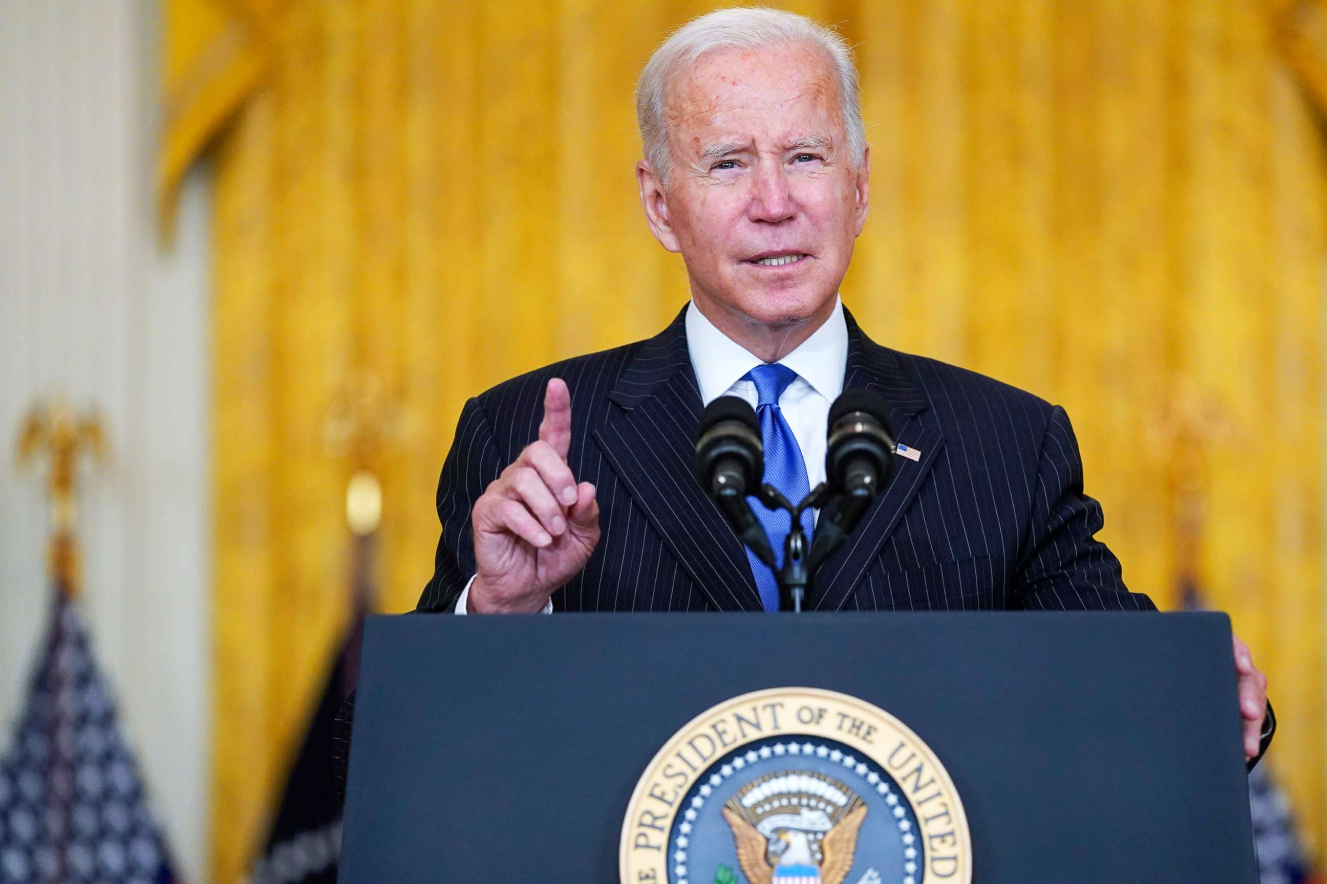 PHOTO: President Joe Biden delivers remarks on efforts to address global supply chain bottlenecks during an event in the East Room of the White House, Oct. 13, 2021.