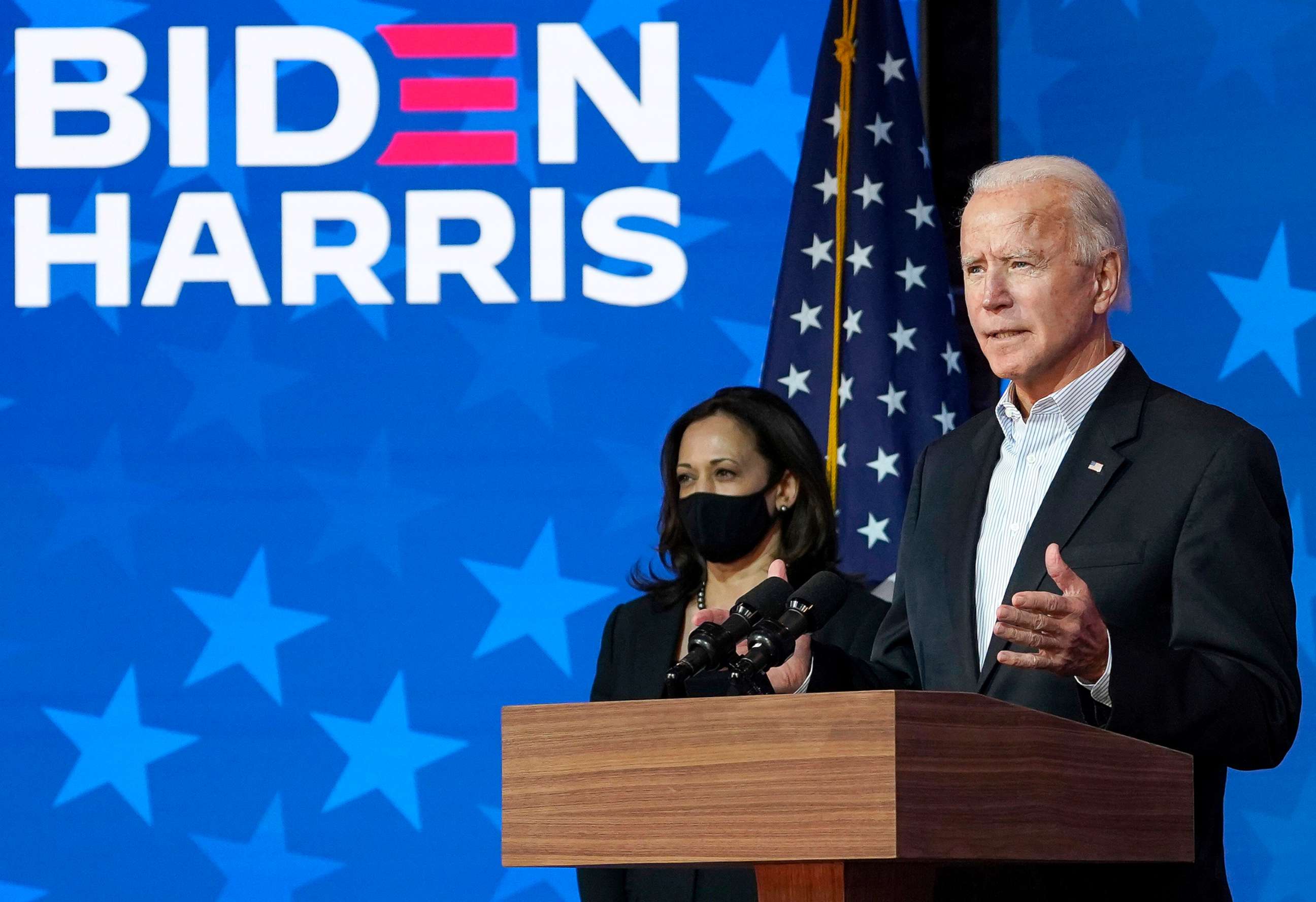 PHOTO: Joe Biden speaks as Sen. Kamala Harris listens at The Queen theater in Wilmington, Del., Nov. 05, 2020.