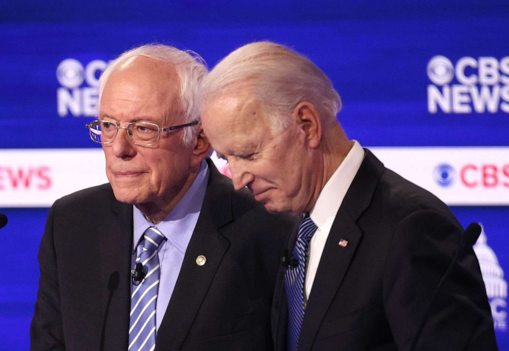 PHOTO:Sen. Bernie Sanders and former Vice President Joe Biden speak during a break at the Democratic presidential primary debate at the Charleston Gaillard Center in Charleston, S.C., Feb. 25, 2020.