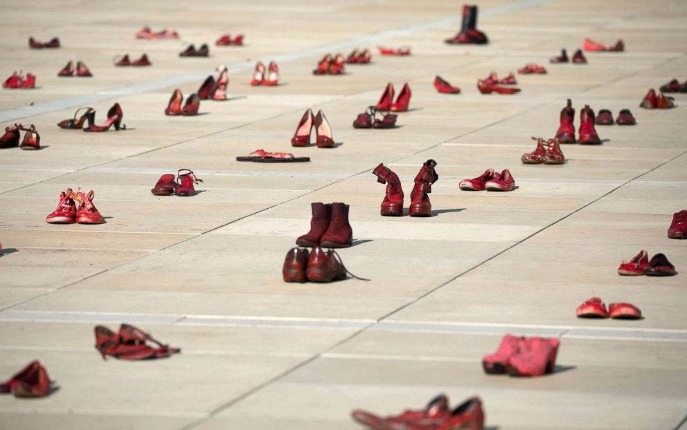 PHOTO: Pairs of red shoes are on display in a central square in Tel Aviv as part of the protest calling for an end to violence against women, Dec. 4, 2018.