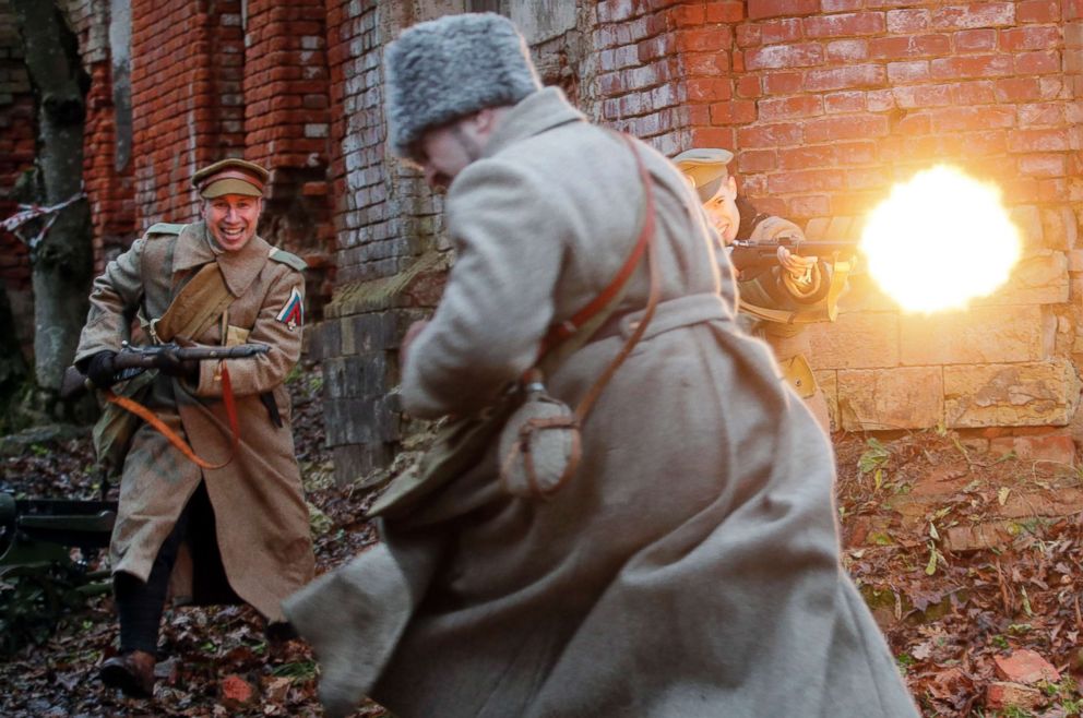 PHOTO: Reenactors participate in a Russian Civil War battle reconstruction to mark the 100th anniversary of the battles between Red and White armies after the Bolshevik revolution outside of St. Petersburg, Russia, Nov. 18, 2018. 