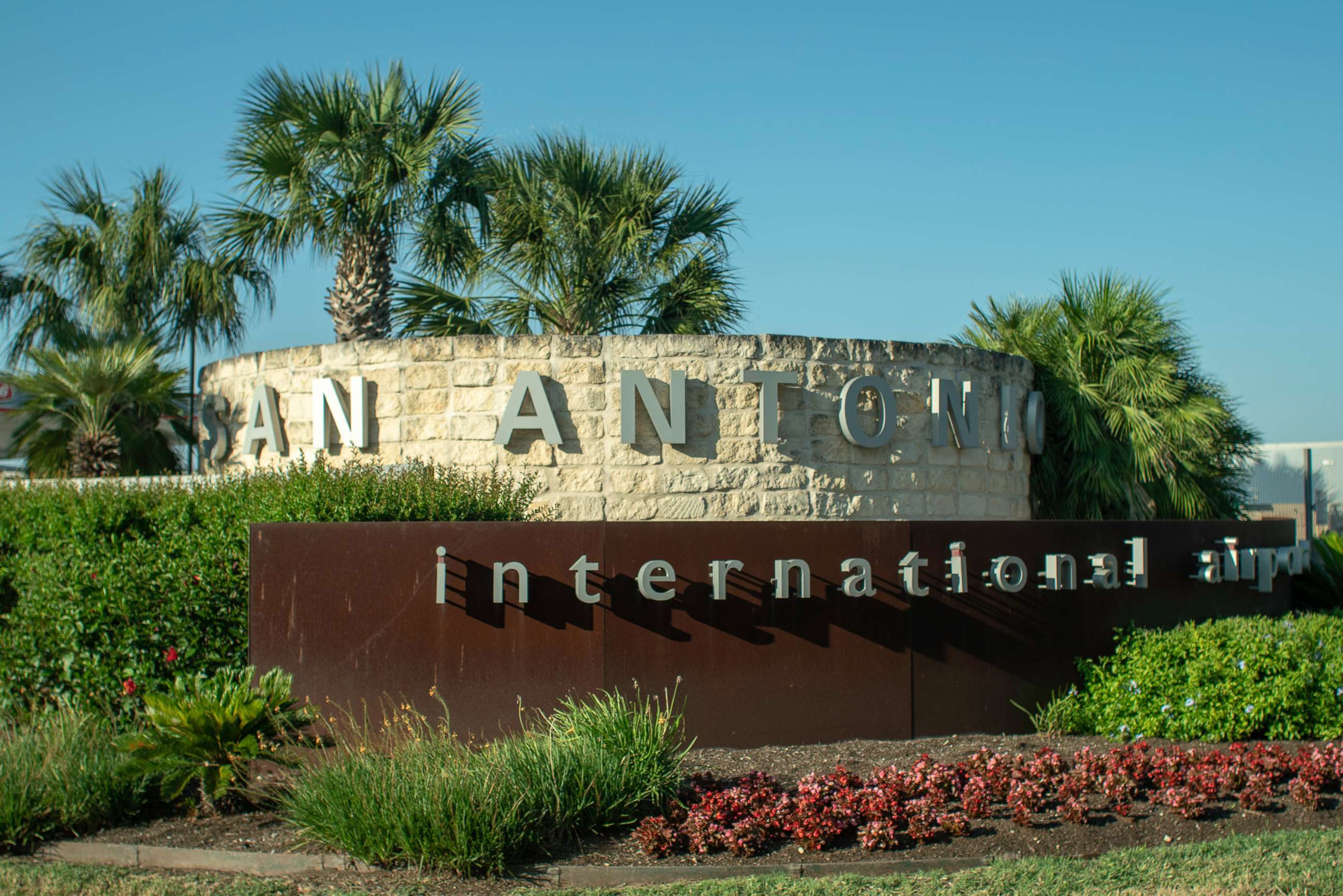 PHOTO: San Antonio International Airport entrance is marked by a sign, May 19, 2020.