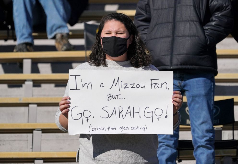 PHOTO:  A Missouri Tigers fan holds up a sign in support of Vanderbilt Commodores place kicker Sarah Fuller during the first half at Faurot Field at Memorial Stadium in Columbia, Mo., Nov. 28, 2020.