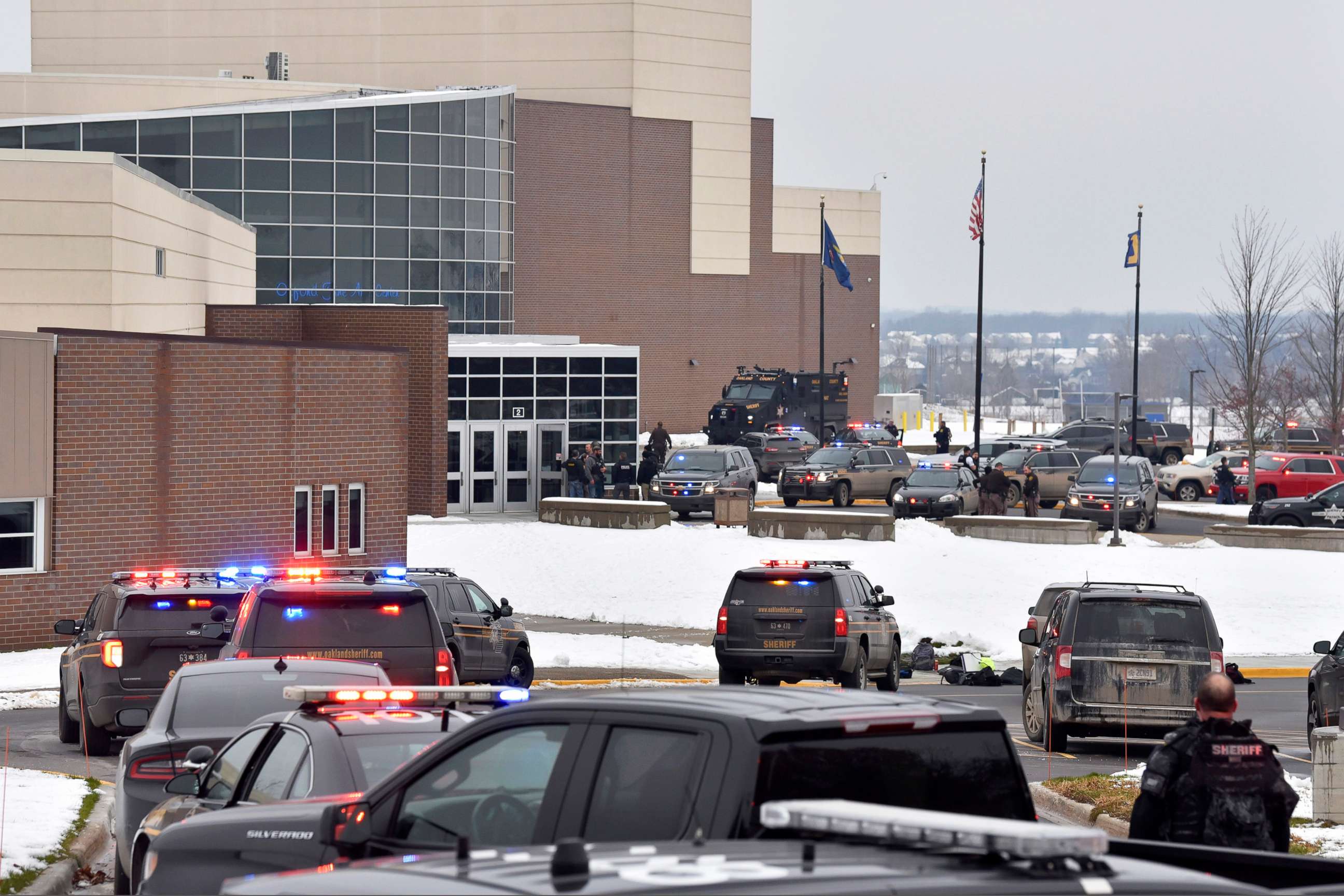 PHOTO:Dozens of police, fire, and EMS personnel work on the scene of a shooting at Oxford High School, Oxford Township, Mich., Nov. 30, 2021.