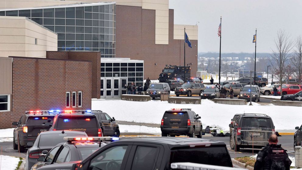 PHOTO:Dozens of police, fire, and EMS personnel work on the scene of a shooting at Oxford High School, Oxford Township, Mich., Nov. 30, 2021.