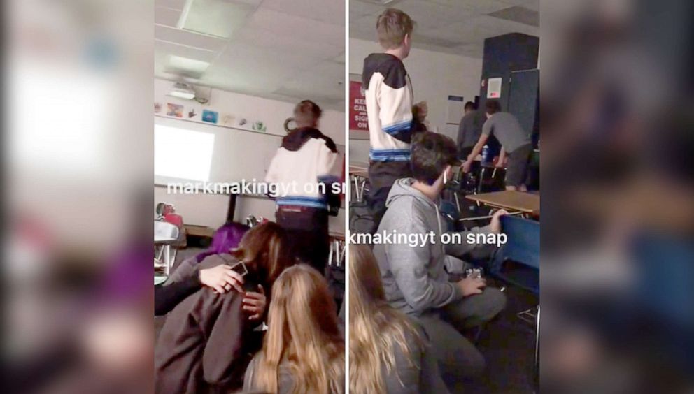 PHOTO: Stills from social media video show students huddled and barricaded as they shelter in place during an active shooting incident at Oxford High School in Oxford, Mich., Nov. 30, 2021.