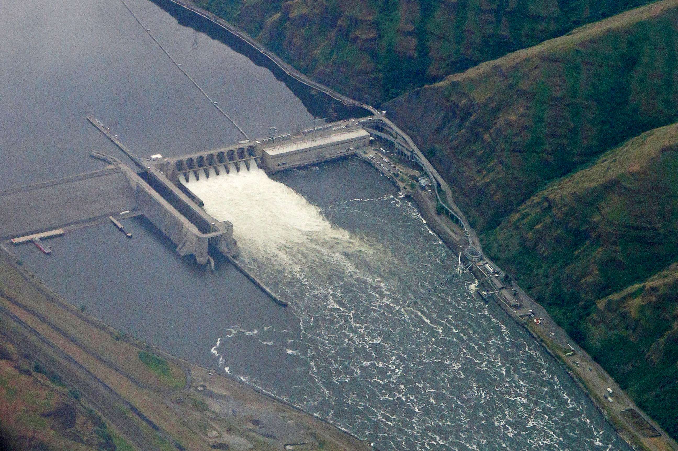 PHOTO: FILE -The Lower Granite Dam spills into the Snake River in Whitman County, WA in this May 2019 photo. Congressman Simpson (R-ID) is proposing to breach this and 3 other dams to help fish migration