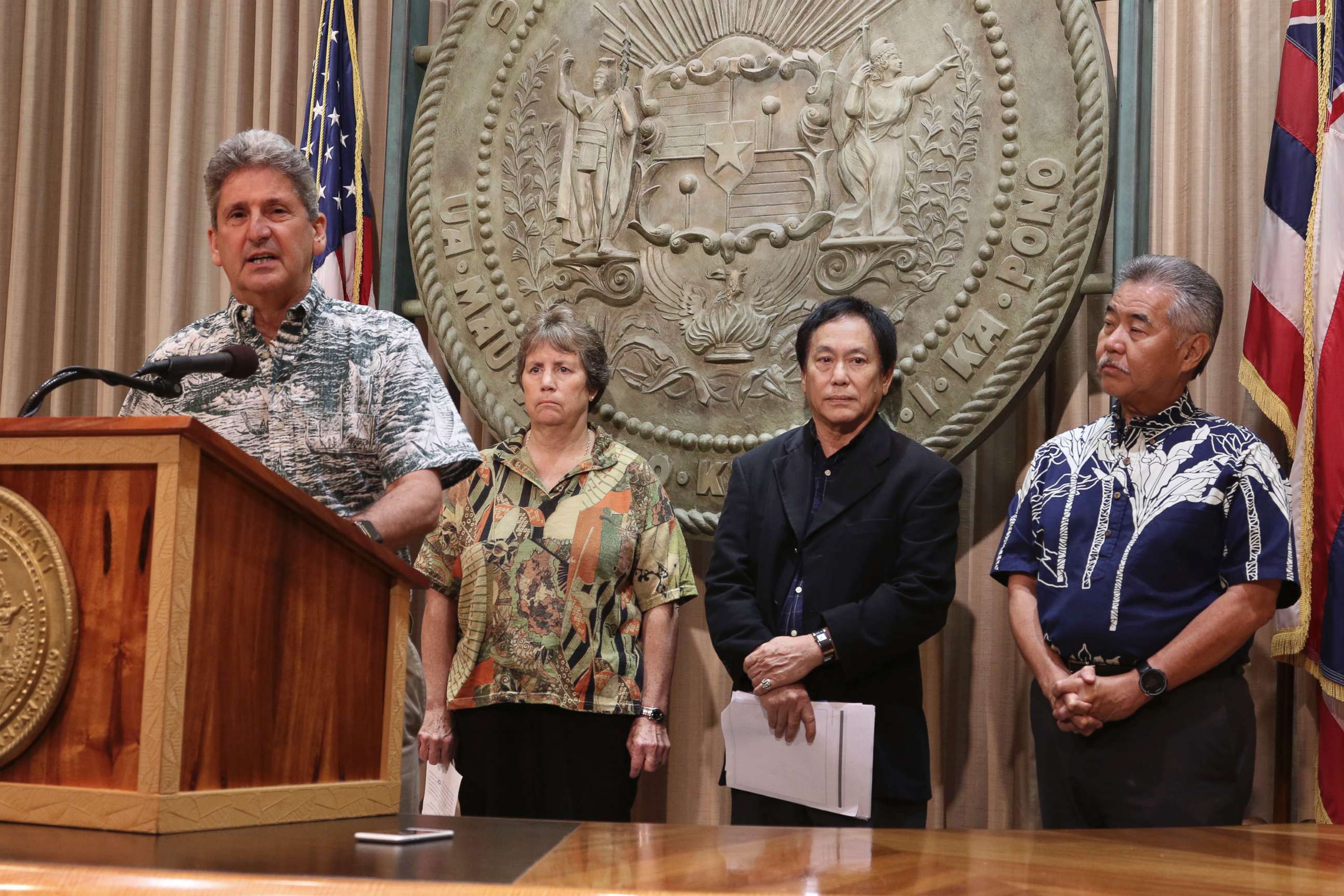 PHOTO: University of Hawaii President David Lassner, left, speaks at a news conference, Oct. 30, 2018 in Honolulu regarding a Hawaii Supreme Court ruling upholding a decision to grant a permit for the the Thirty Meter Telescope on Mauna Kea.