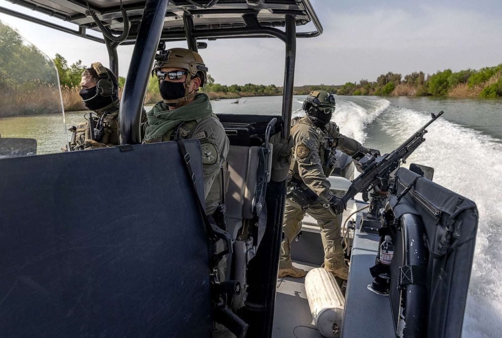 PHOTO: In March 23, 2021, file photo, members of the Texas Department of Public Safety's Tactical Marine Unit patrol the Rio Grande along the U.S.-Mexico Border near Mission, Texas.