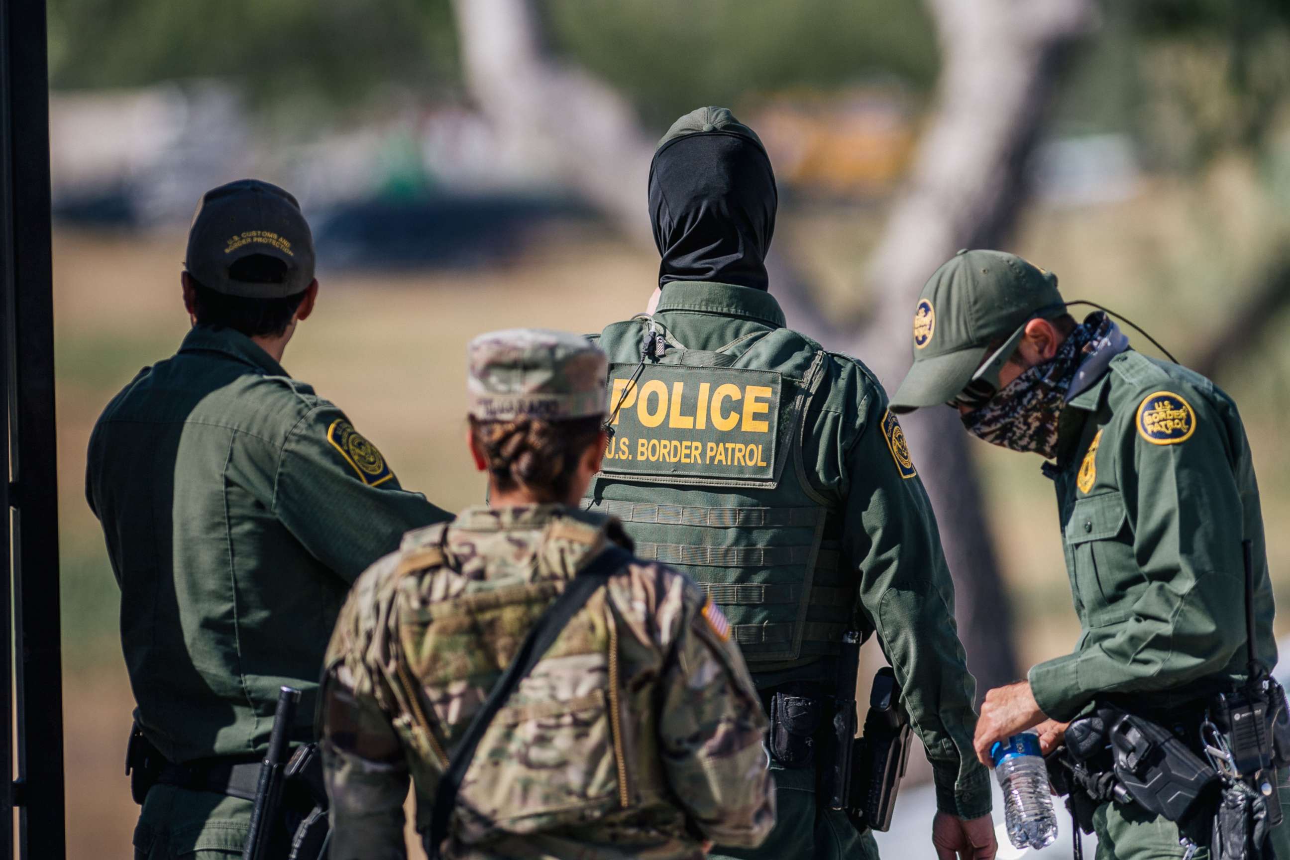 PHOTO: In this Sept. 22, 2021, file photo, Border Patrol Agents and members of the National Guard patrol a checkpoint entry near the Del Rio International Bridge in Del Rio, Texas.