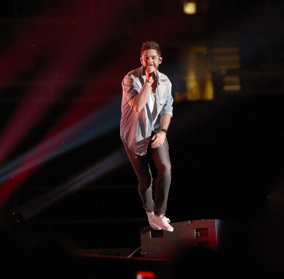 PHOTO: Thomas Rhett performs onstage during the 2018 CMA Music festival at Nissan Stadium, June 10, 2018, in Nashville.