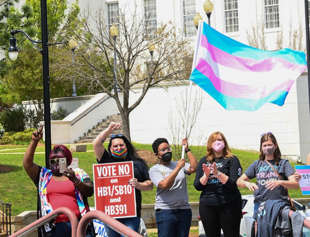 PHOTO: Opponents of several bills targeting transgender youth attend a rally at the Alabama State House to draw attention to anti-transgender legislation, on March 30, 2021, in Montgomery, Ala.