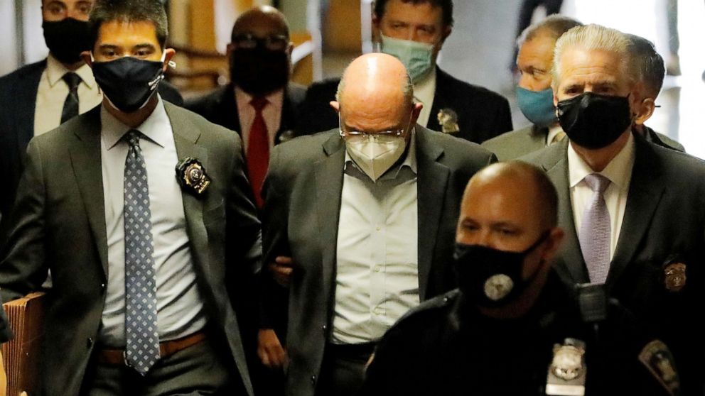 PHOTO: Trump Organization chief financial officer Allen Weisselberg is escorted as he attends his arraignment hearing in the New York State Supreme Court in the Manhattan borough of New York, July 1, 2021.