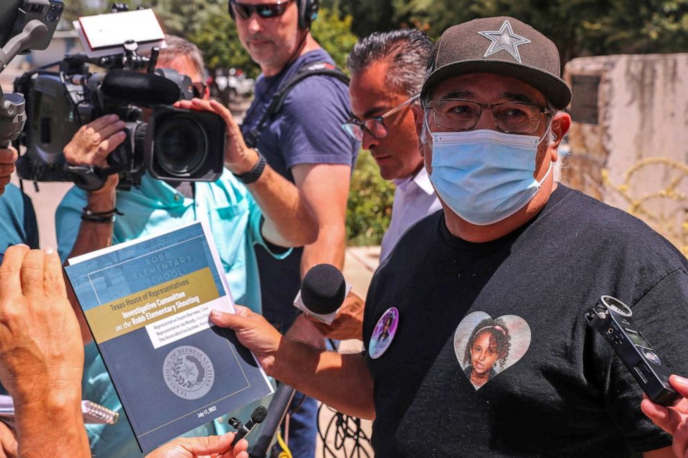 PHOTO:  Vicente Salazar, grandfather of Layla Salazar, a victim of the Uvalde mass shooting, holds up a copy of a preliminary report from the special House investigative commitee on the mass shooting at Robb Elementary in Uvlade, Texas,  July 17, 2022.
