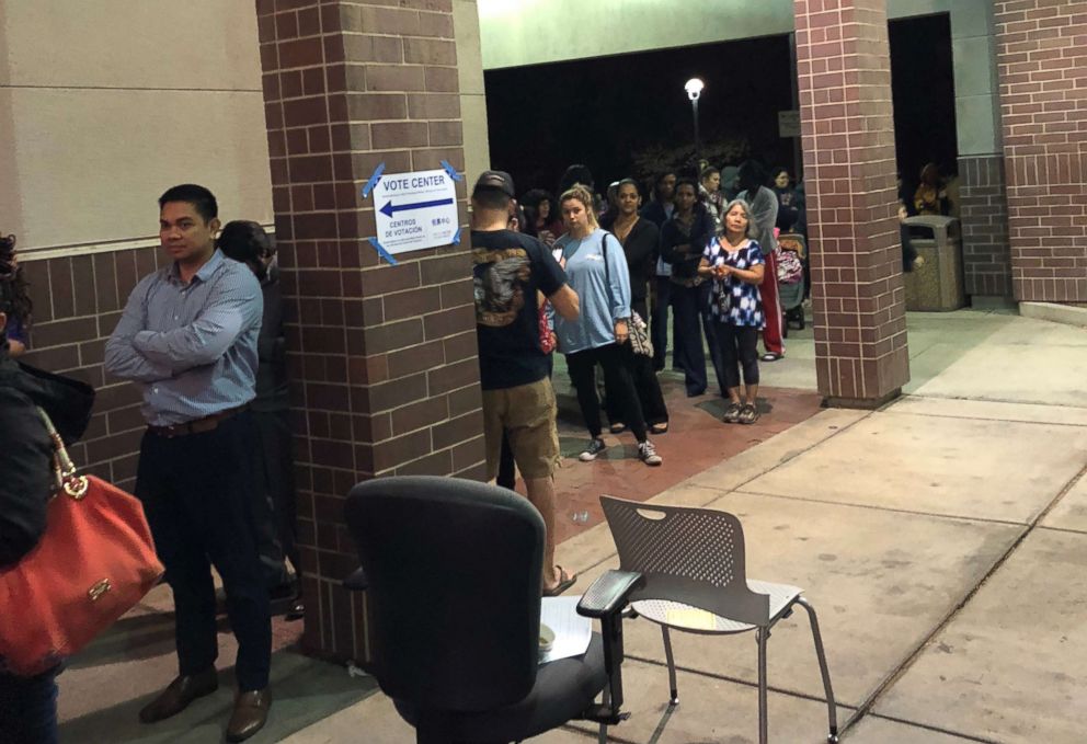 PHOTO: Vishal Kaura was in good company still waiting on line in the cold to vote Tuesday night in Elk Grove, Calif.