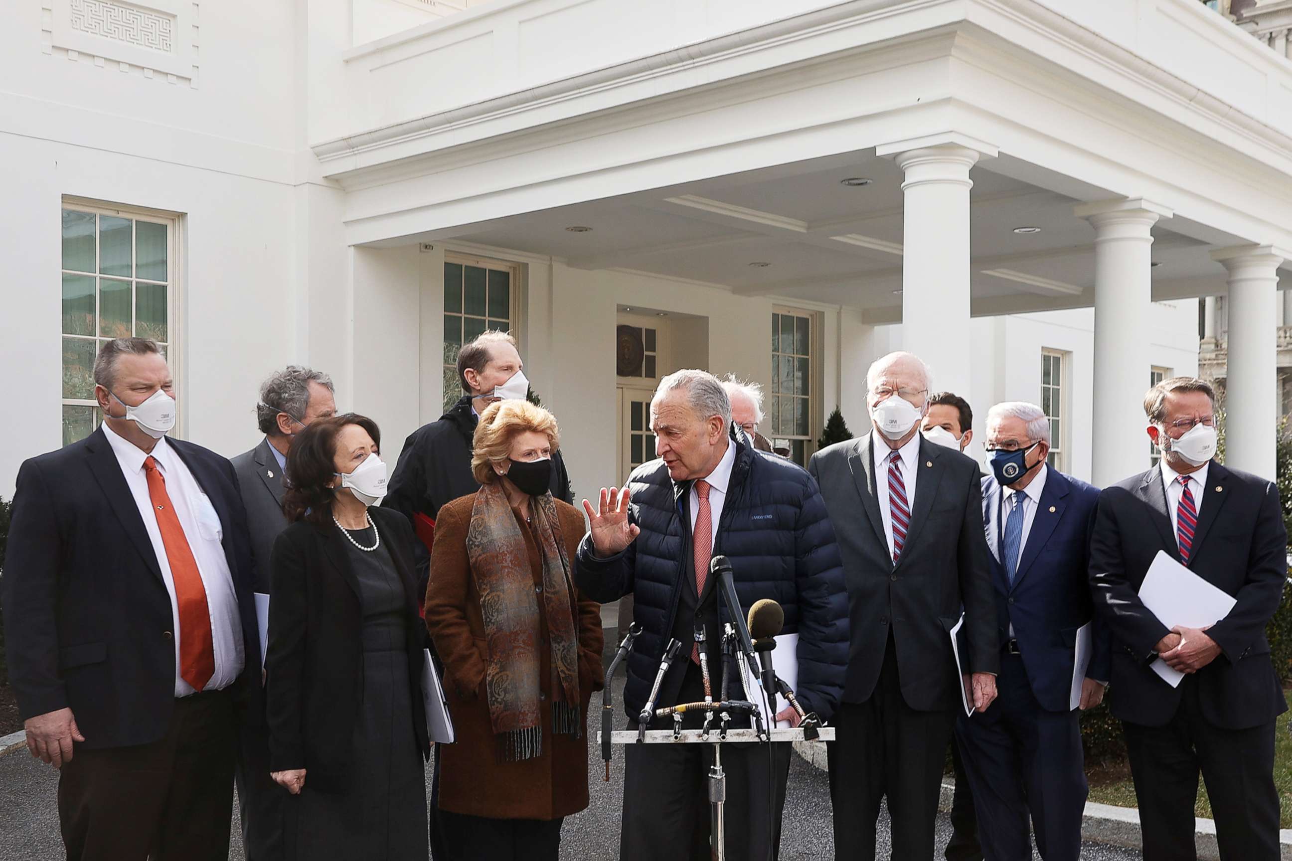 PHOTO: Senate Majority Leader Charles Schumer is joined by Democratic senators to talk briefly to reporters outside the West Wing after meeting with President Joe Biden, Feb. 3, 2021.