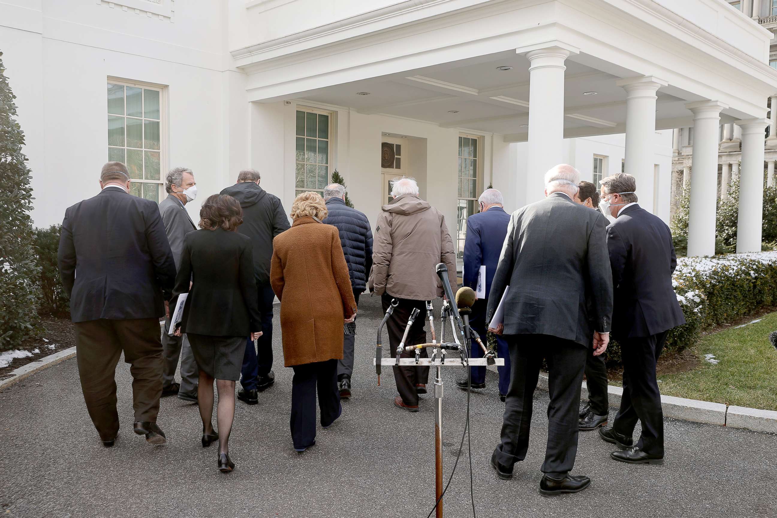 PHOTO: Senate Majority Leader Charles Schumer is joined by Democratic senators to talk briefly to reporters outside the West Wing after meeting with President Joe Biden, Feb. 3, 2021.