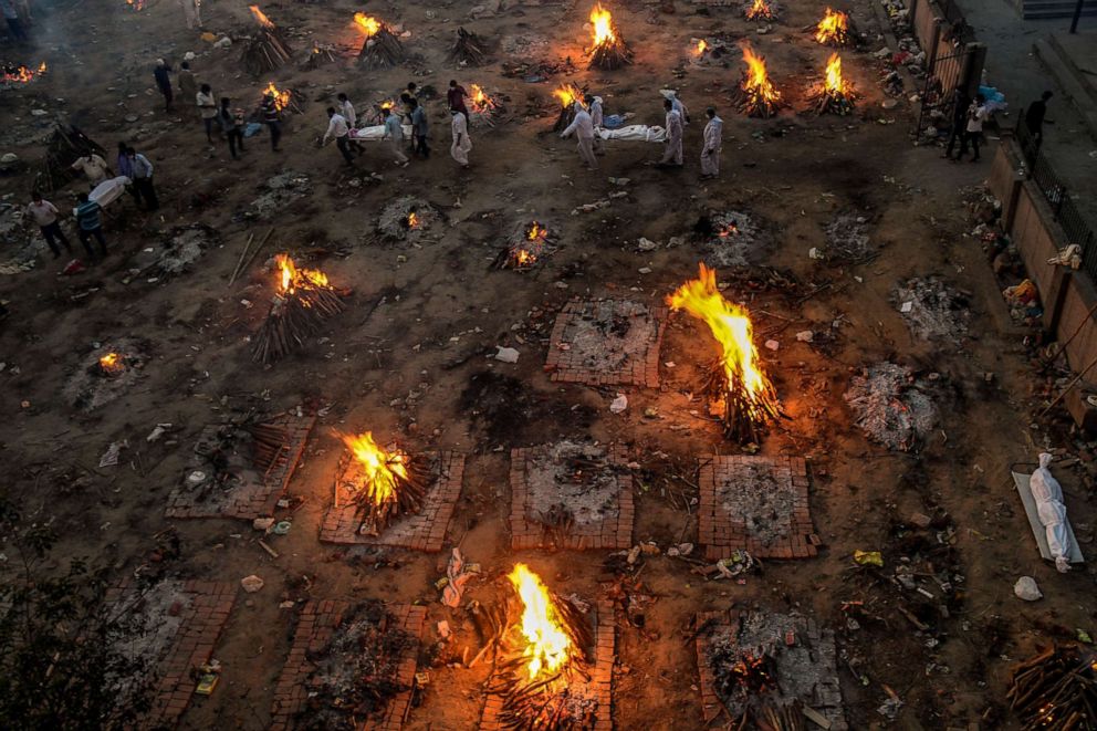 PHOTO: New bodies arrive at a mass cremation site in Delhi, April 23, 2021.
