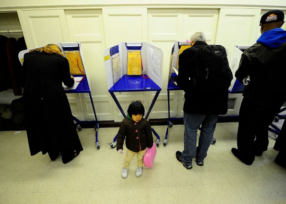 PHOTO: New York residents cast their vote in the mid-term elections at a polling station at a school in New York, Nov. 2, 2010.