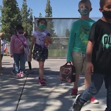 VIDEO: Students head back to school in Georgia as mask debate rages