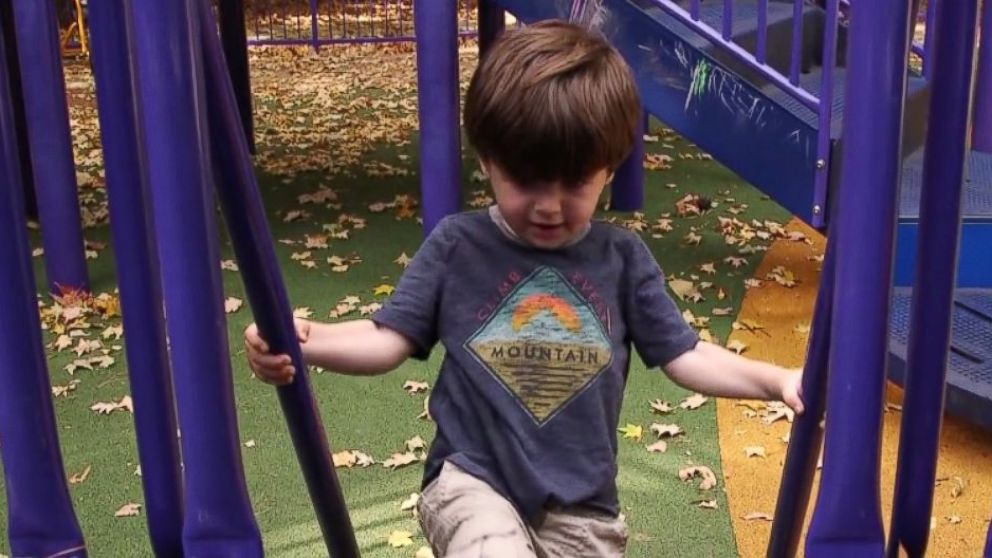 PHOTO: Toddler Lennon Landry plays on a playground at Vanderbilt University in Nashville, Tennessee. He is a frequent participant of autism studies at the school.