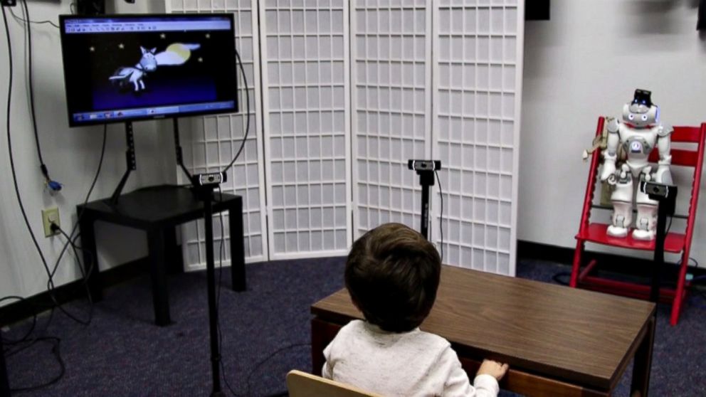 PHOTO: A little robot named RASL, better known as 'Russell', tries to train toddlers with Autism Spectrum Disorder (ASD) to pay attention. 