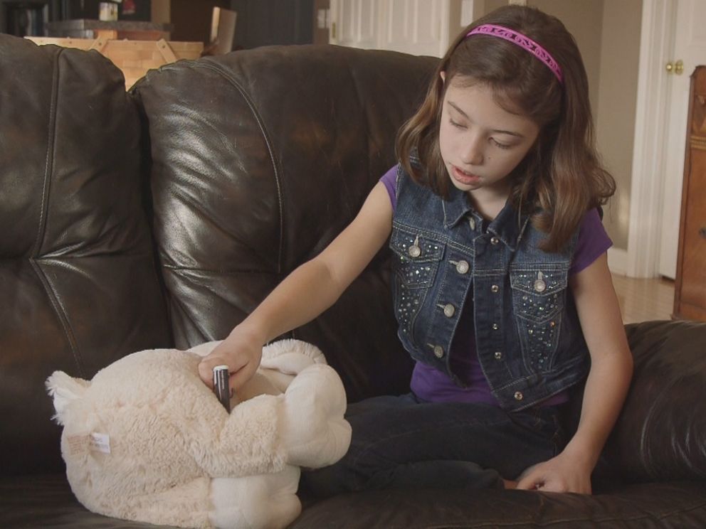 PHOTO: Audrey Stepp injects her toy named Lamb with Naloxone.