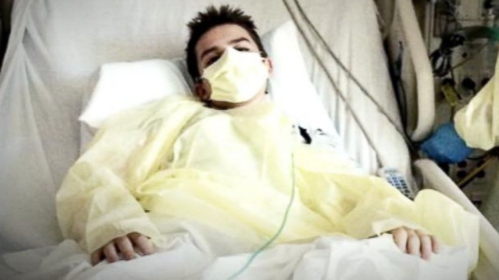Simon Humphrey is pictured in his hospital bed. 