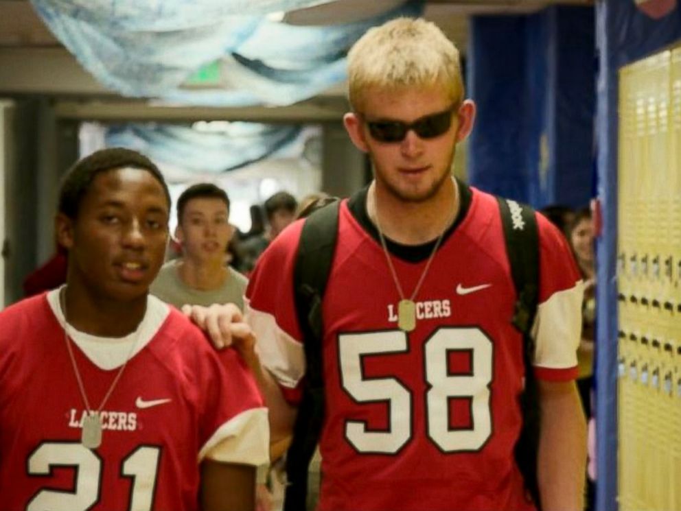 PHOTO: Jake Olson, right, is seen at school with a friend in this ABC video grab.