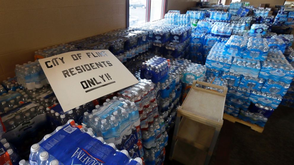 Cases of bottled water are stored at a church in Flint, Mich., February 5, 2016.   After months of national attention on lead-tainted drinking water in Flint, residents are starting to question the 74-mile pipeline from Lake Huron to the Flint. 