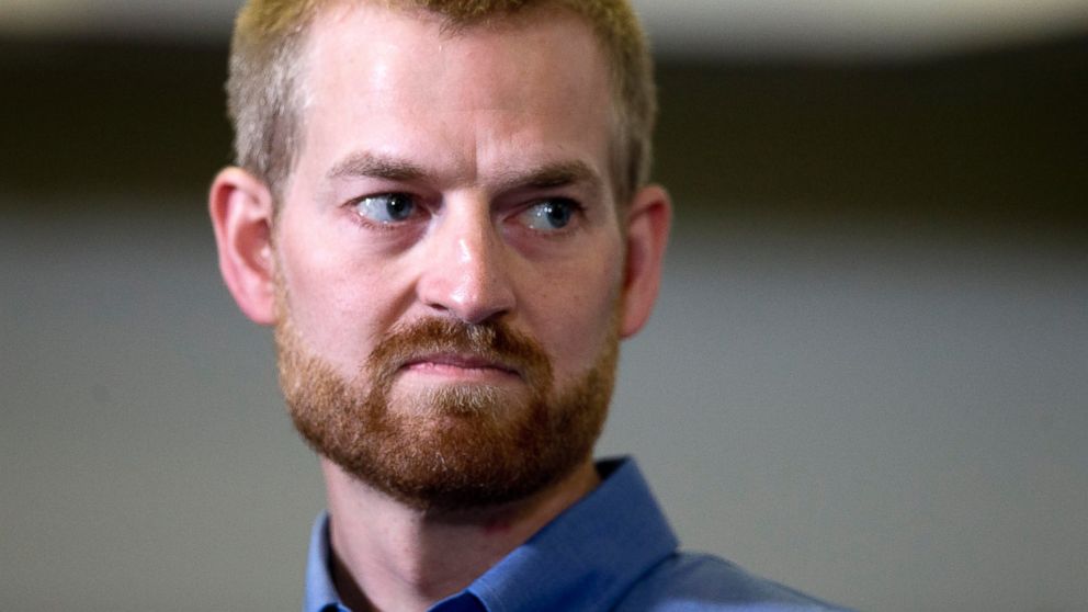 Ebola victim Dr. Kent Brantly looks on during a news conference after being released from Emory University Hospital, Aug. 21, 2014, in Atlanta.