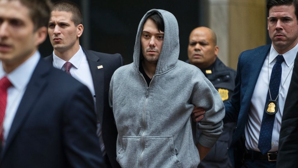 Martin Shkreli, the former hedge fund manager under fire for buying a pharmaceutical company and ratcheting up the price of a life-saving drug, is escorted by law enforcement agents in New York City on Dec. 17, 2015.