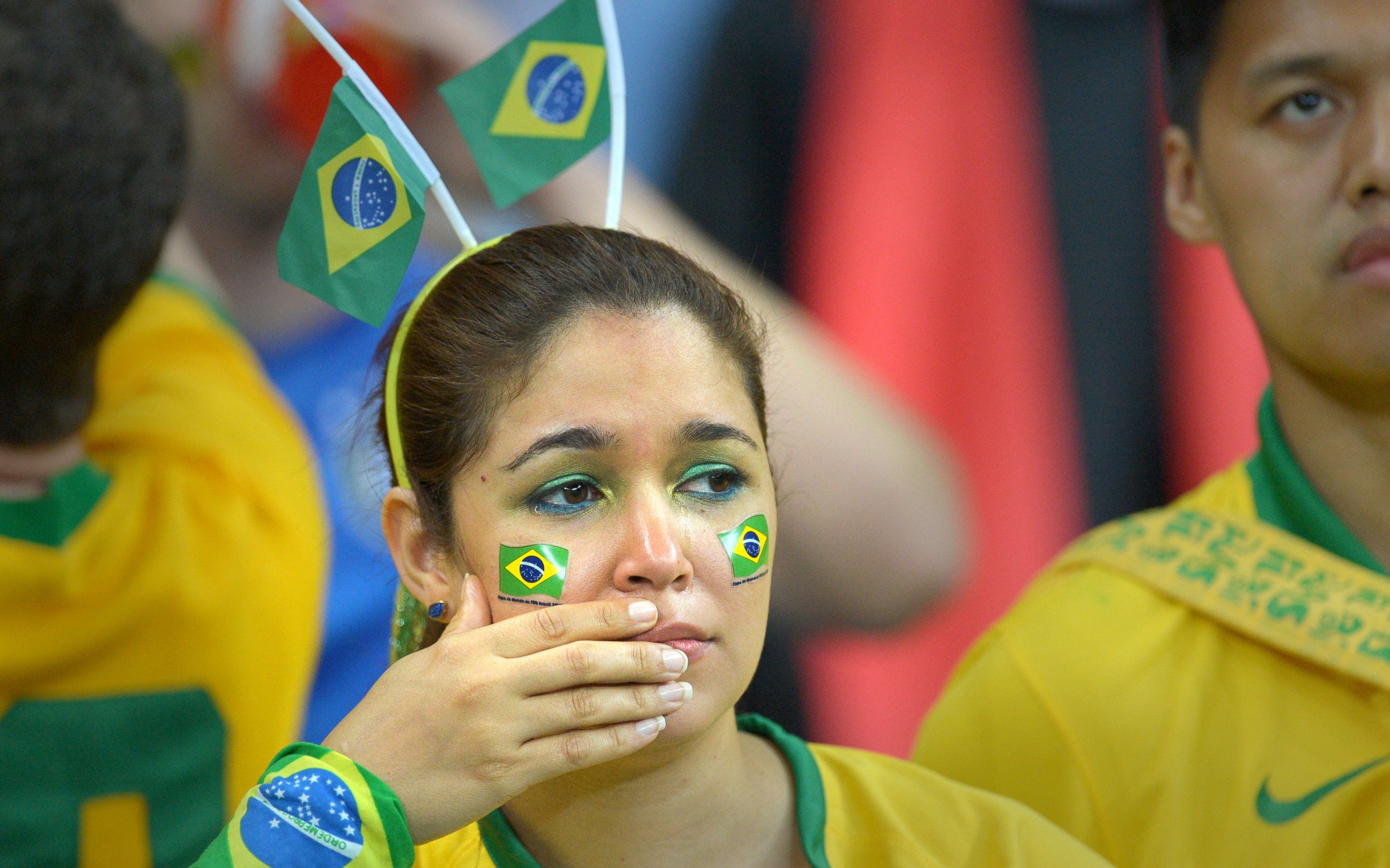 PHOTO: A supporter of Brazil in tears is pictured during the FIFA World Cup 2014 semi-final soccer match between Brazil and Germany at Estadio Mineirao in Belo Horizonte, Brazil on July 8, 2014. 
