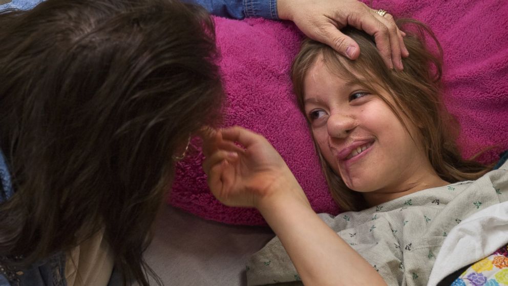 PHOTO: Charlotte Ponce, 11, waits with her mom Sharon Ponce at Beaumont Children's Hospital in Royal Oak, Mich., April 15, 2014.