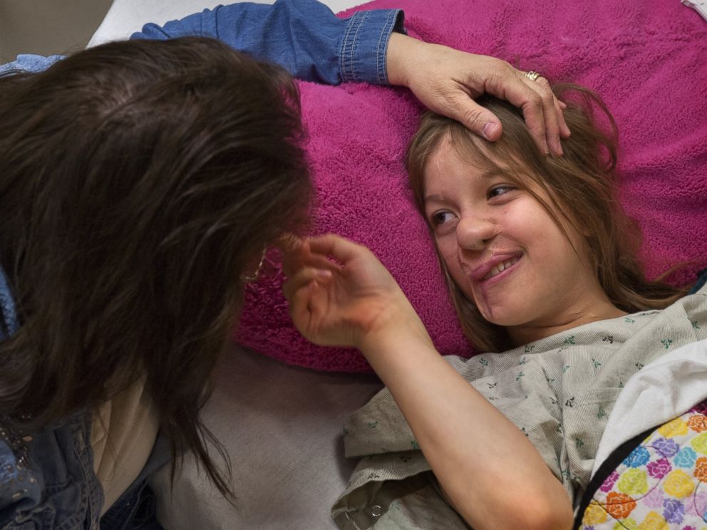 PHOTO: Charlotte Ponce, 11, waits with her mom Sharon Ponce at Beaumont Children's Hospital in Royal Oak, Mich., April 15, 2014.