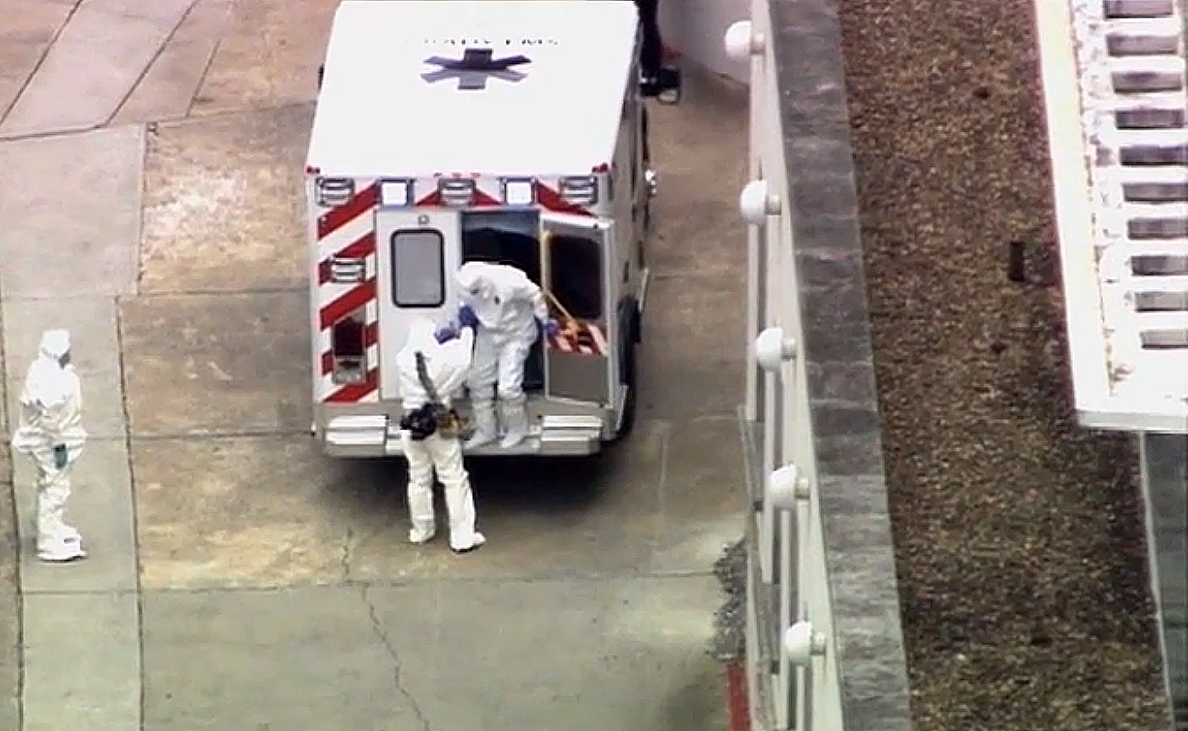 PHOTO: An ambulance arrives with Ebola victim Dr. Kent Brantly, right, to Emory University Hospital, Saturday, Aug. 2, 2014, in Atlanta.