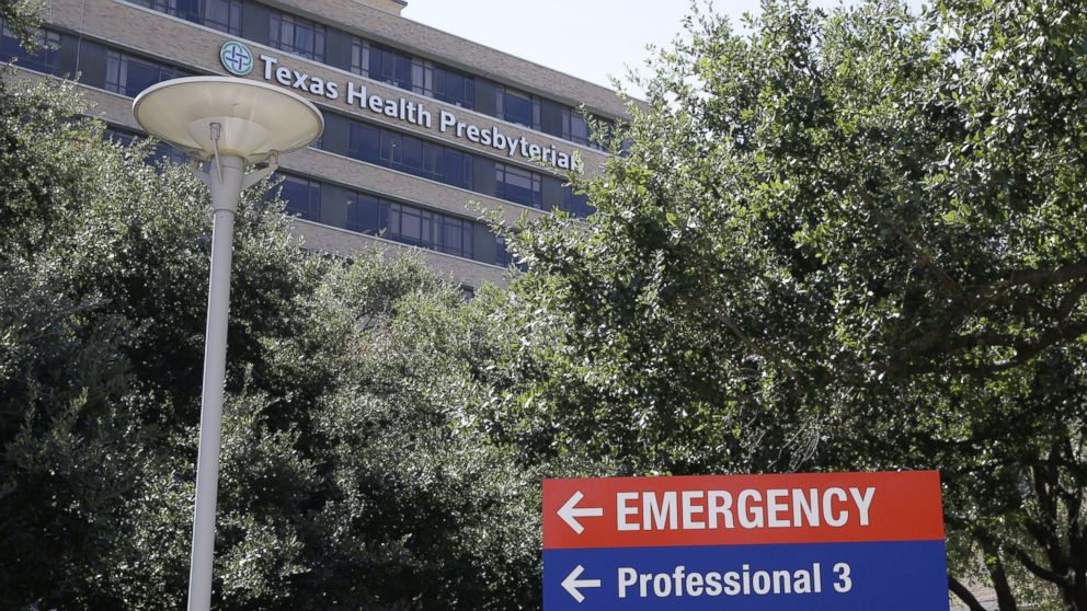 A sign points to the emergency room at Texas Health Presbyterian Hospital  where Thomas Eric Duncan, the Ebola patient who traveled from Liberia to Dallas,  is being treated, Oct. 4, 2014, in Dallas.  