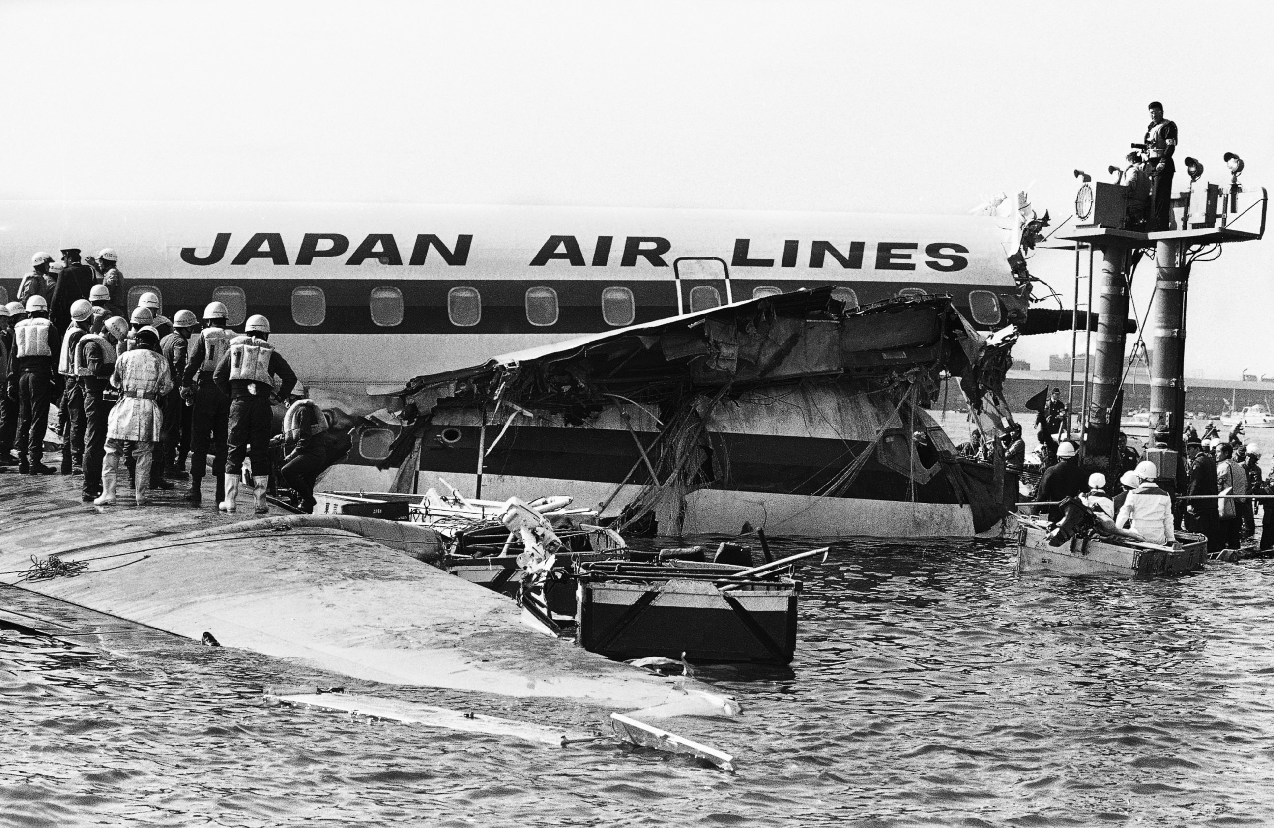 PHOTO: Nose of Japan Air Lines DC-8 jetliner is visible below and inside main body of airliner which crashed in Tokyo Bay on Tuesday, Feb. 9, 1982, while making a landing approach. 