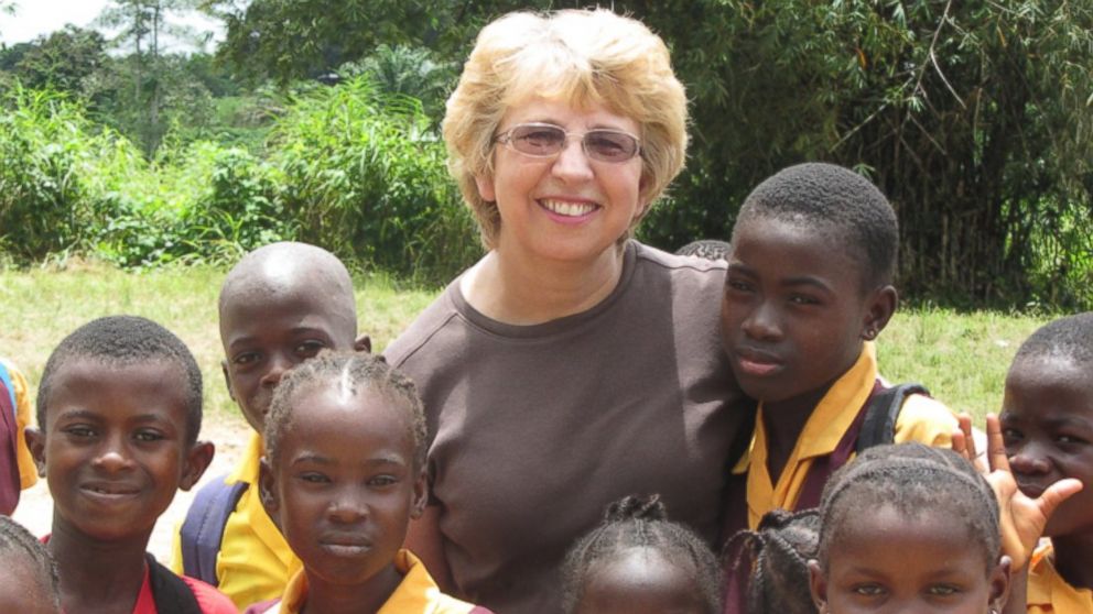 PHOTO: This Oct. 7, 2013 photo provided by Jeremy Writebol shows his mother, Nancy Writebol, with children in Liberia. 