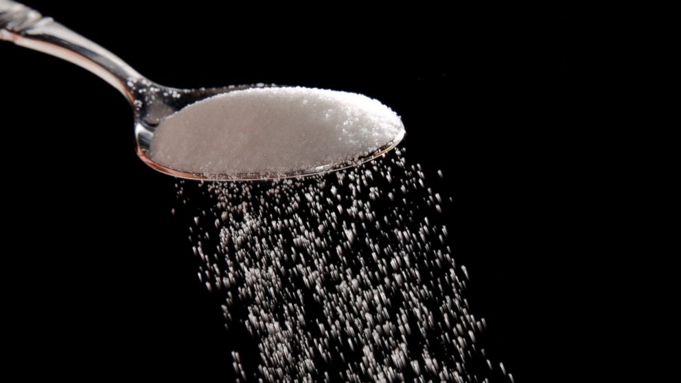Granulated sugar is poured in Philadelphia, Sept. 12, 2016. 
