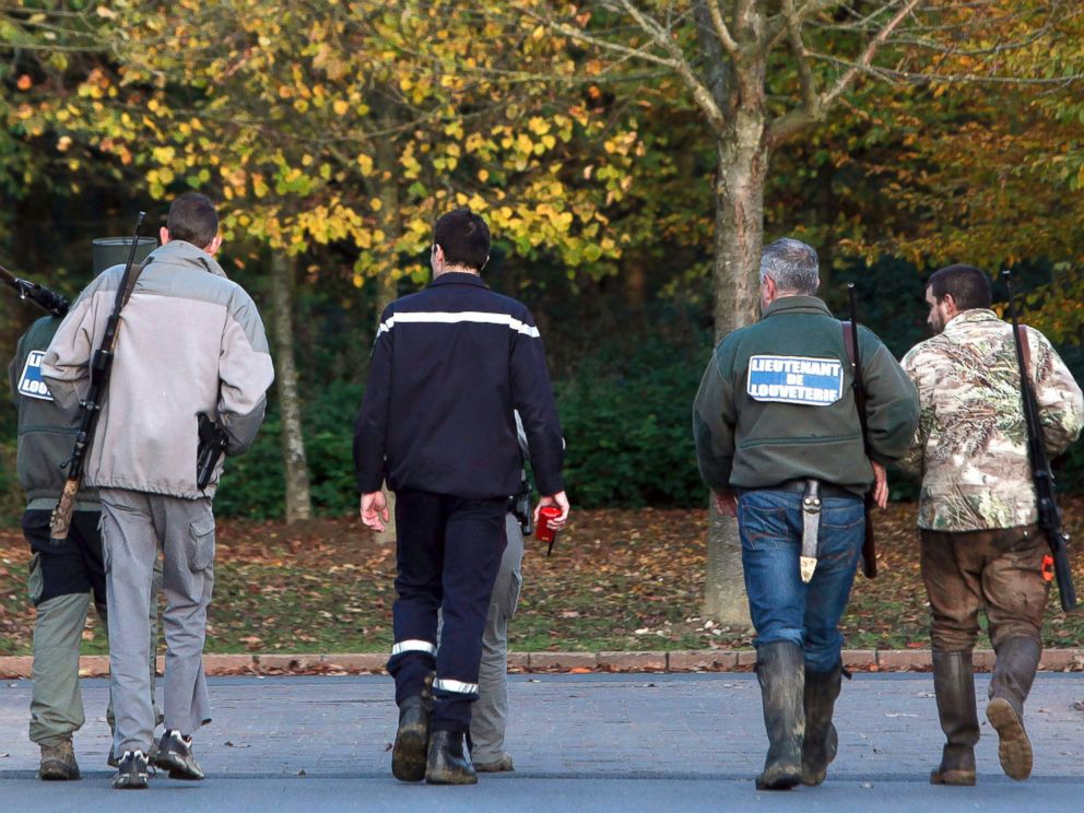 PHOTO: Members of the police animal brigade walk through the streets of Montevrain, east of Paris, Nov. 13, 2014.