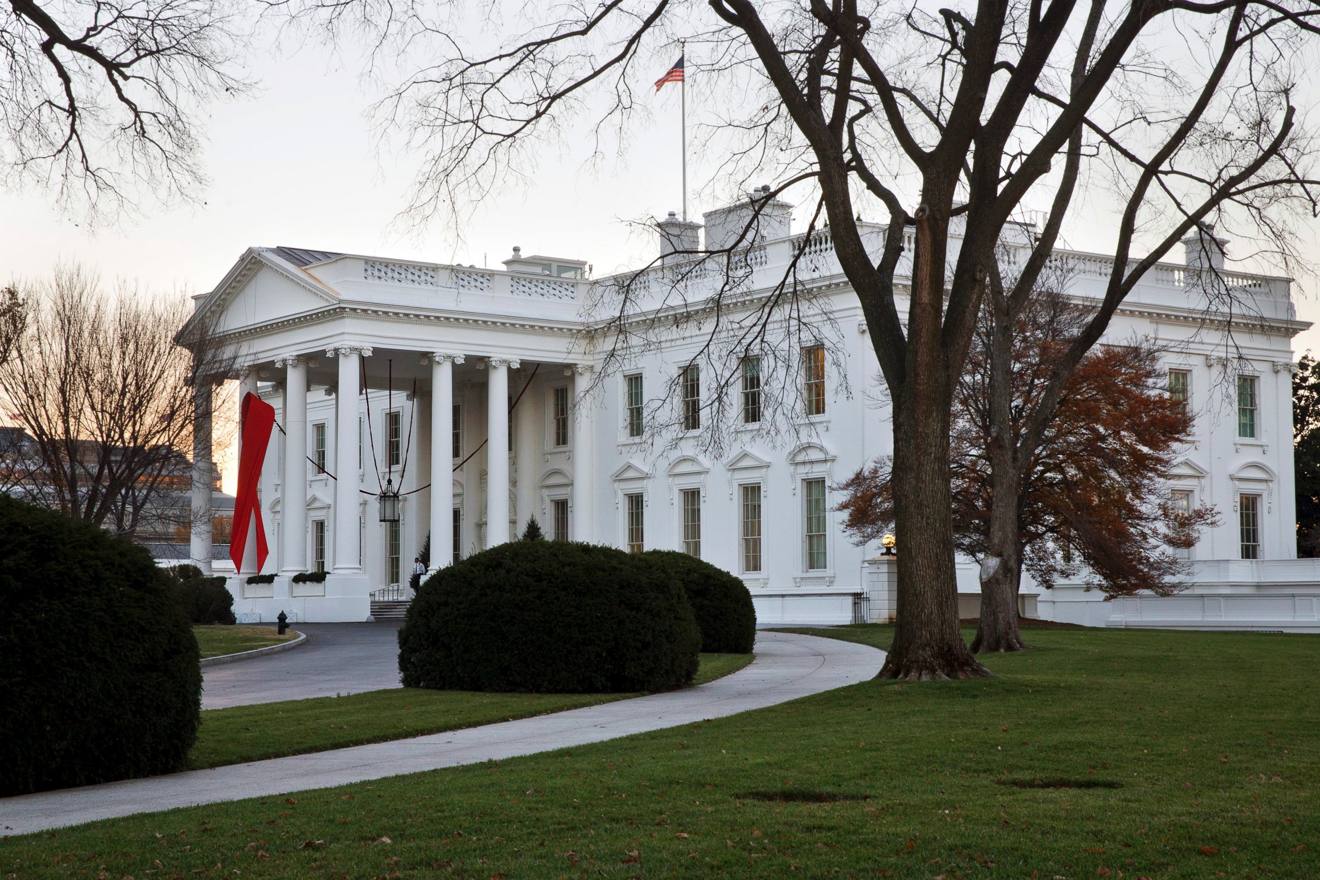 PHOTO: The White House in Washington is decorated with a red ribbon in honor of World AIDS Day, Dec. 1, 2014.