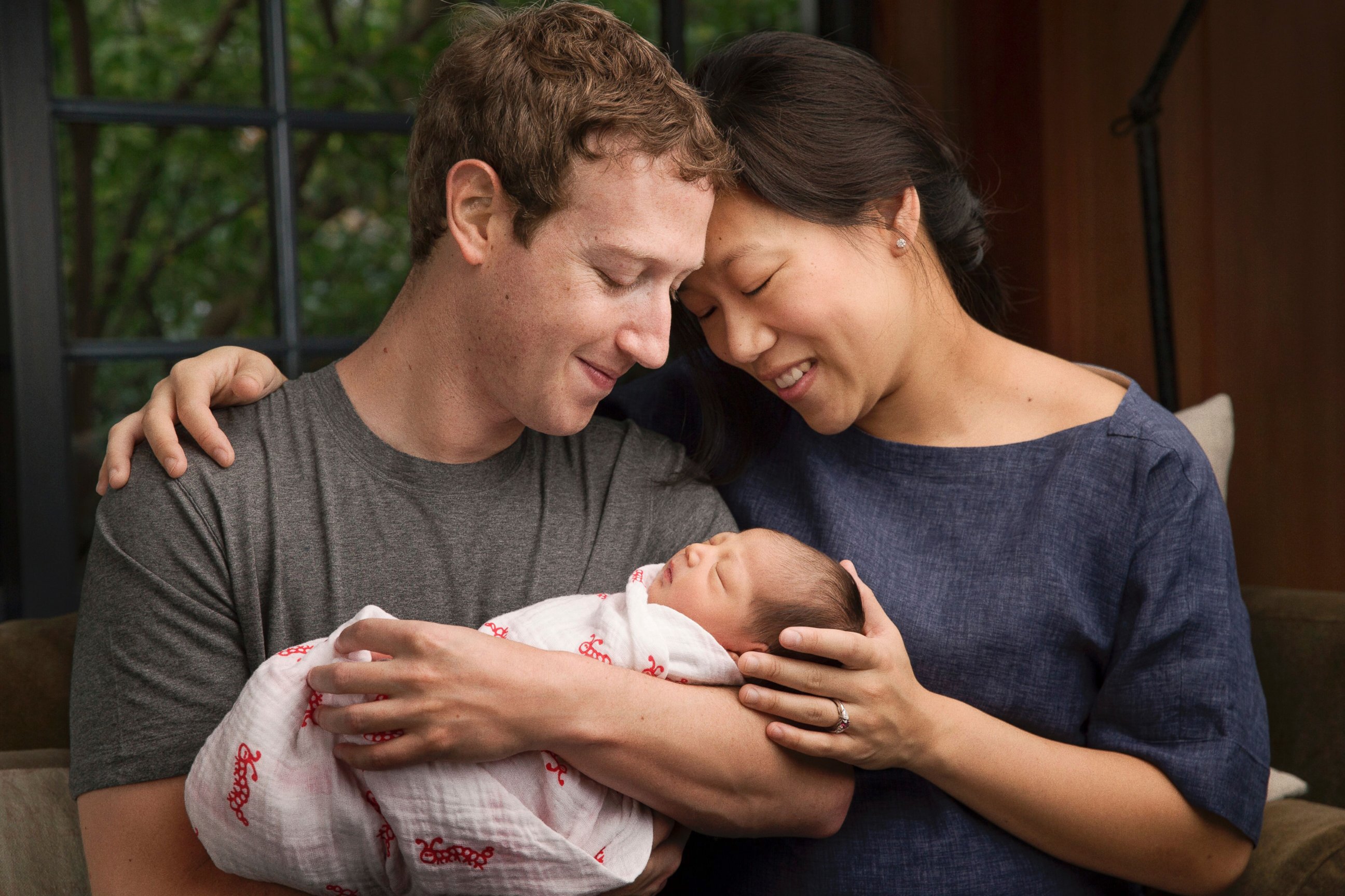 PHOTO: Max Chan Zuckerberg is held by her parents, Mark Zuckerberg and Priscilla Chan Zuckerberg in this undated photo provided by Mark Zuckerberg.  