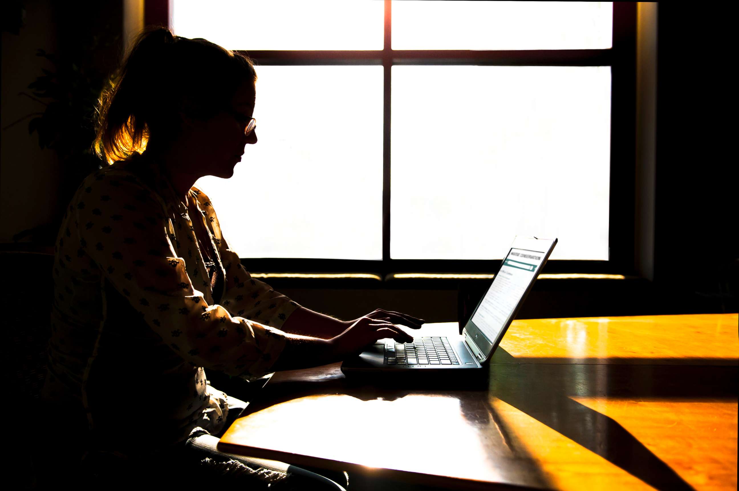 PHOTO: A woman uses a computer in this stock photo.