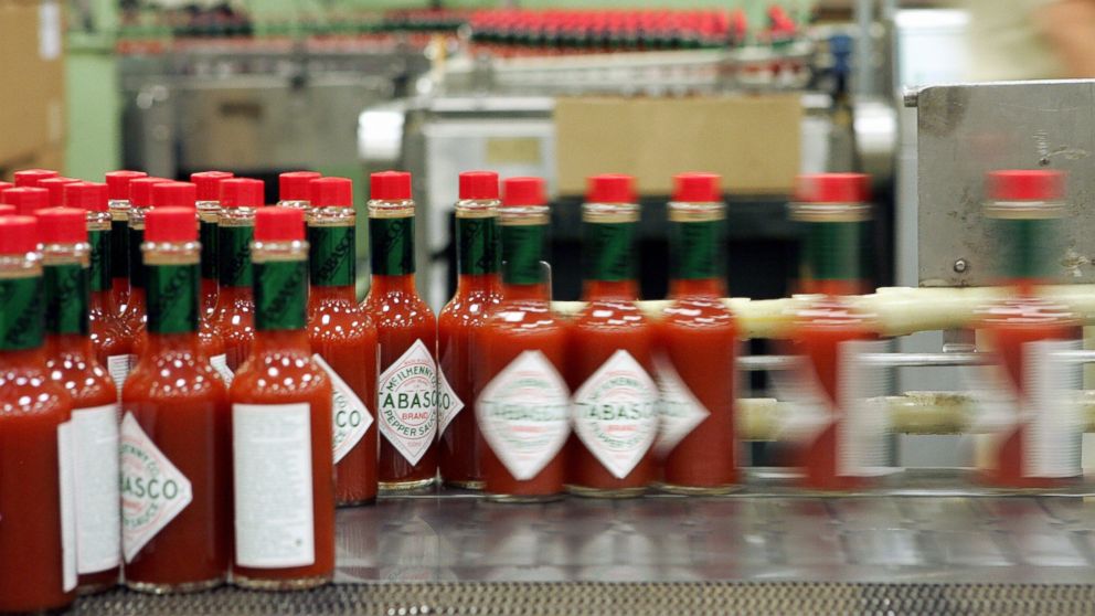 Dozens of health workers in Texas are using Tabasco sauce to help drill for the next Ebola patient. If they get the tingly sauce on their skin during training, they've been "contaminated." Bottles of Tabasco sauce are seen here in this file photo.