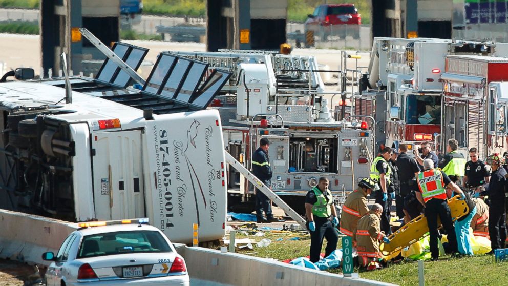 First responders attend to injured passengers after a charter bus hit the concrete median and flipped on the George Bush Highway in Irving, Texas, in 2013. Two people died in the accident. Motor Vehicle crashes in the state of Texas are listed in this report.