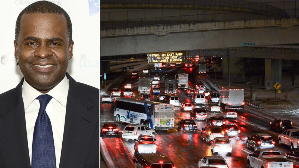 PHOTO: At left, Atlanta Mayor Kasim Reed, and at right, traffic stalled on Interstate 75/85