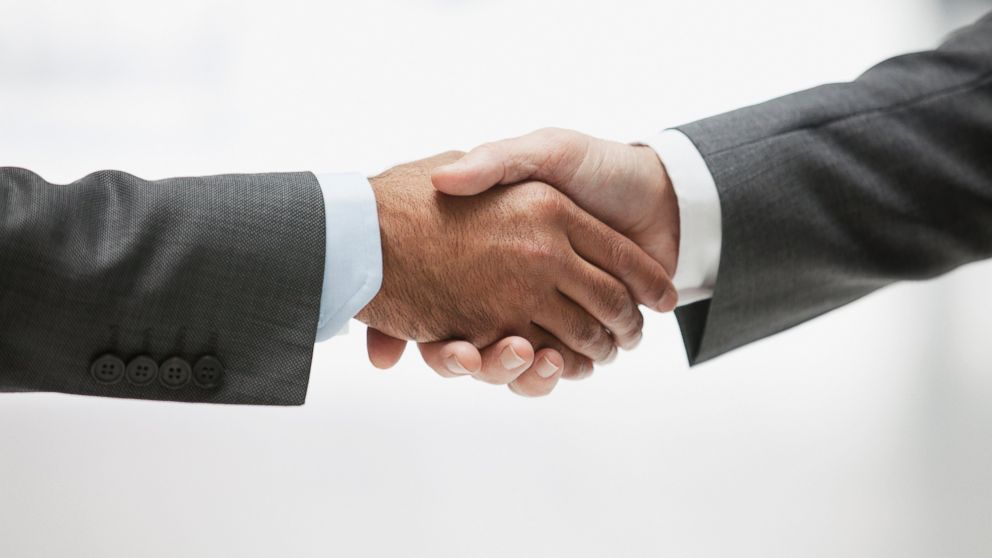 PHOTO: Two businessmen are pictured shaking hands in this stock image. 
