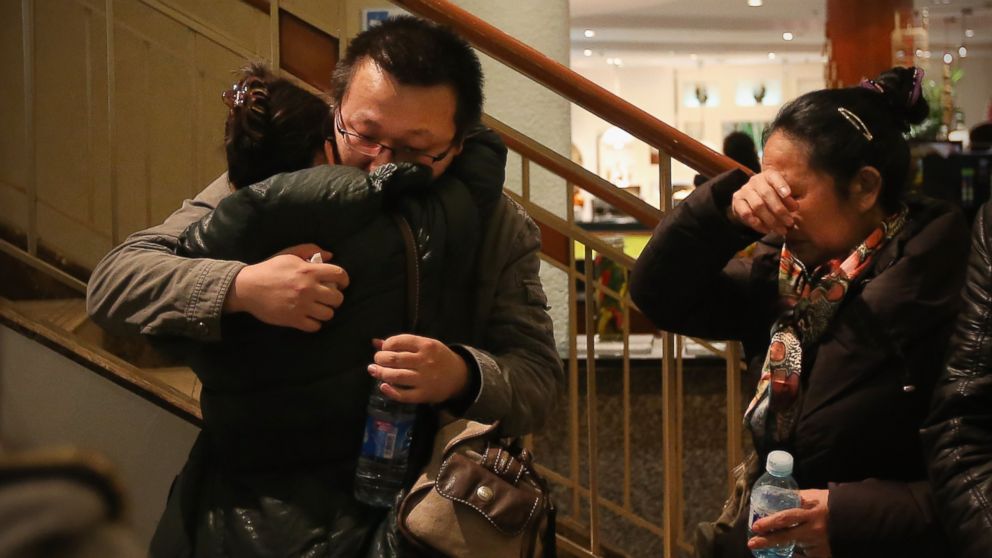 Relatives of a passenger onboard Malaysia Airlines flight MH370 at the Lido Hotel where families are gathered on March 9, 2014 in Beijing, China.