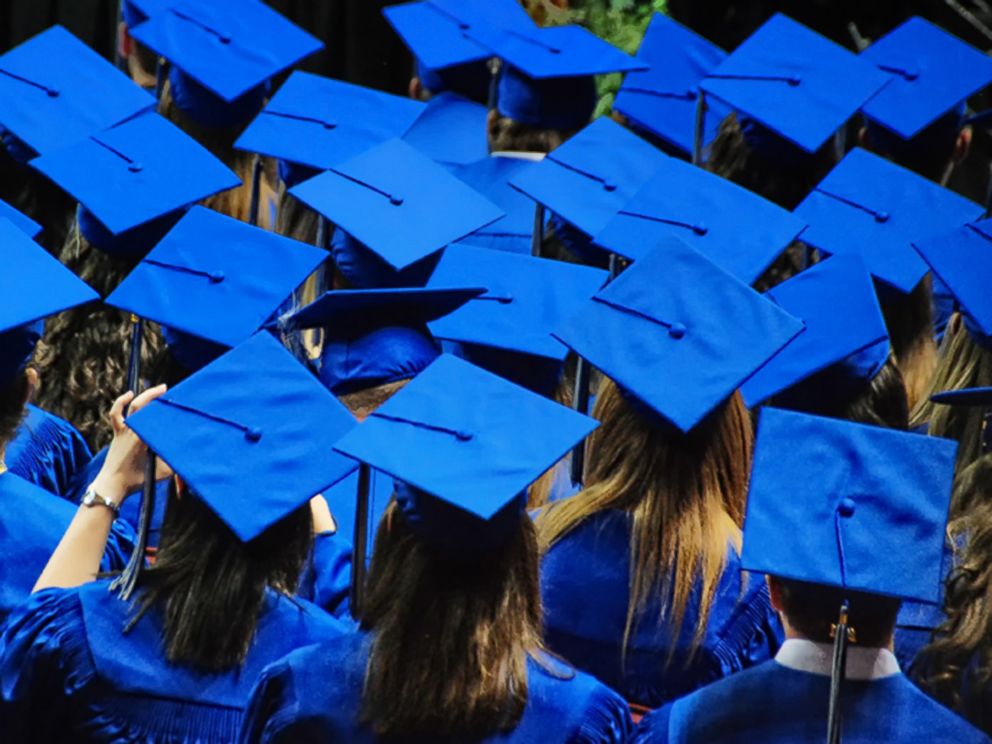 PHOTO: Graduation day is a gathering that can potentially spread disease.